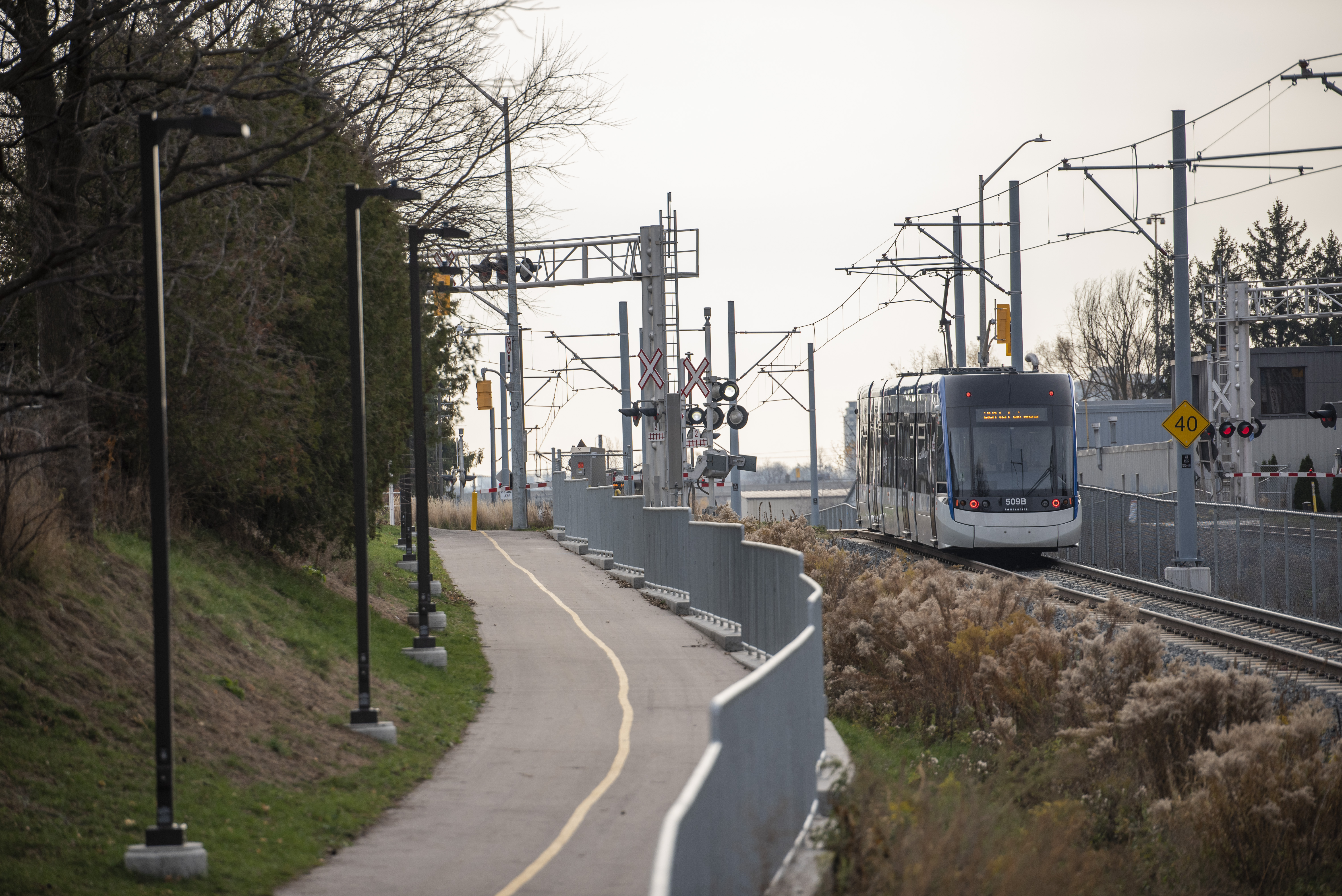 Mill Station Trail running alongside ION light rail tracks